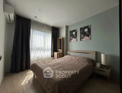 Cozy bedroom with modern decor and natural light