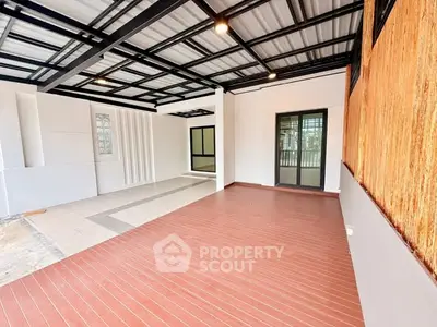 Spacious modern patio with sleek design and ample natural light.