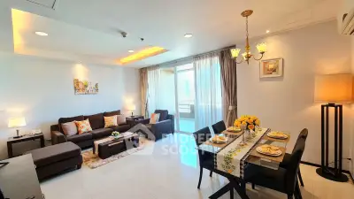 Spacious living and dining area with modern decor and natural light