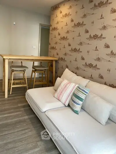 Cozy living room with stylish wallpaper and modern furniture