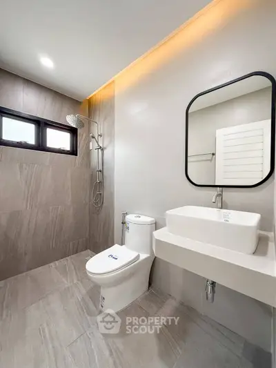 Modern bathroom with sleek fixtures and elegant tile design