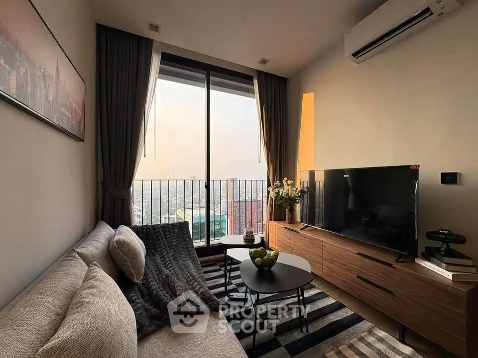 Modern living room with city view, cozy sofa, and stylish decor