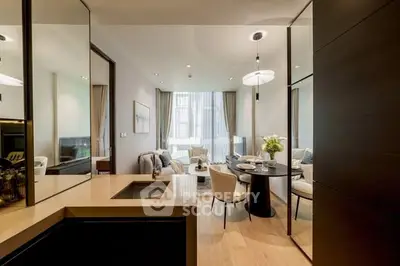 Luxurious modern living room with open kitchen and elegant decor