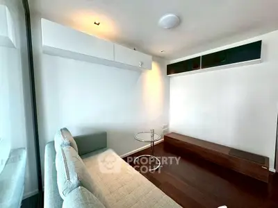 Modern living room with sleek furniture and minimalist design