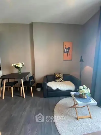 Chic modern living room with cozy seating and stylish decor, perfect for urban living.