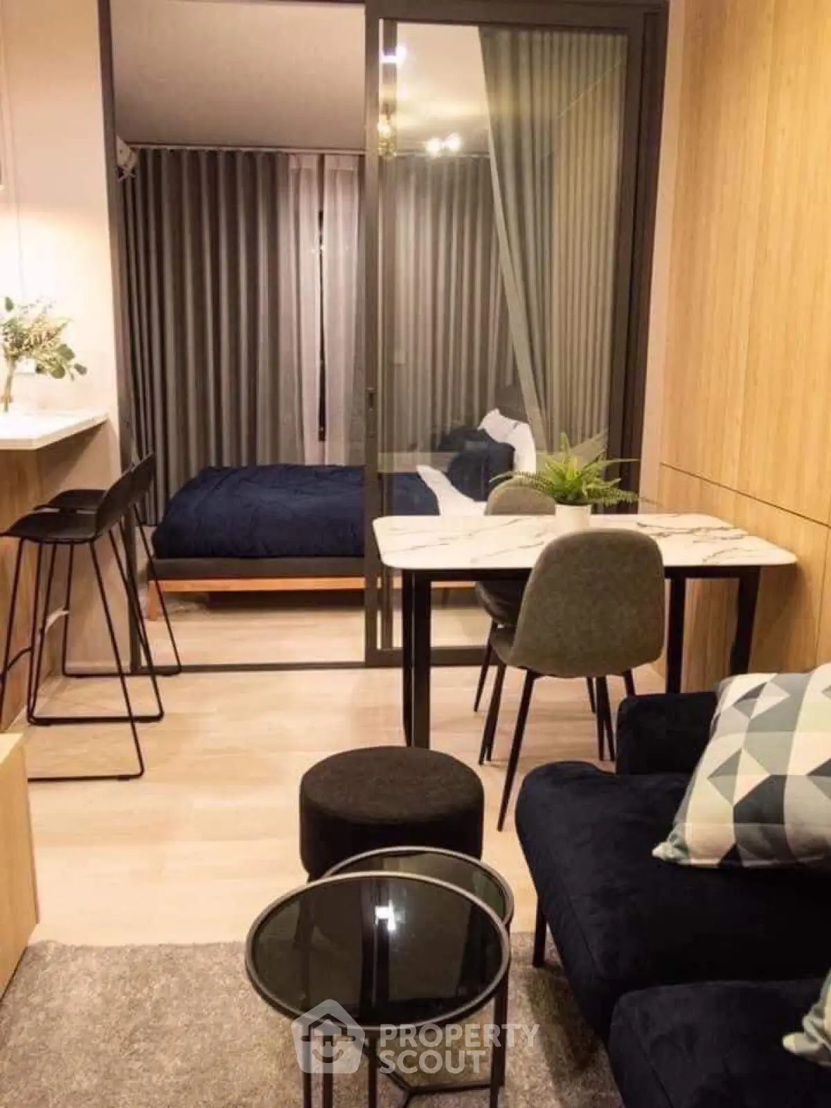 Modern studio apartment with stylish furniture and cozy ambiance