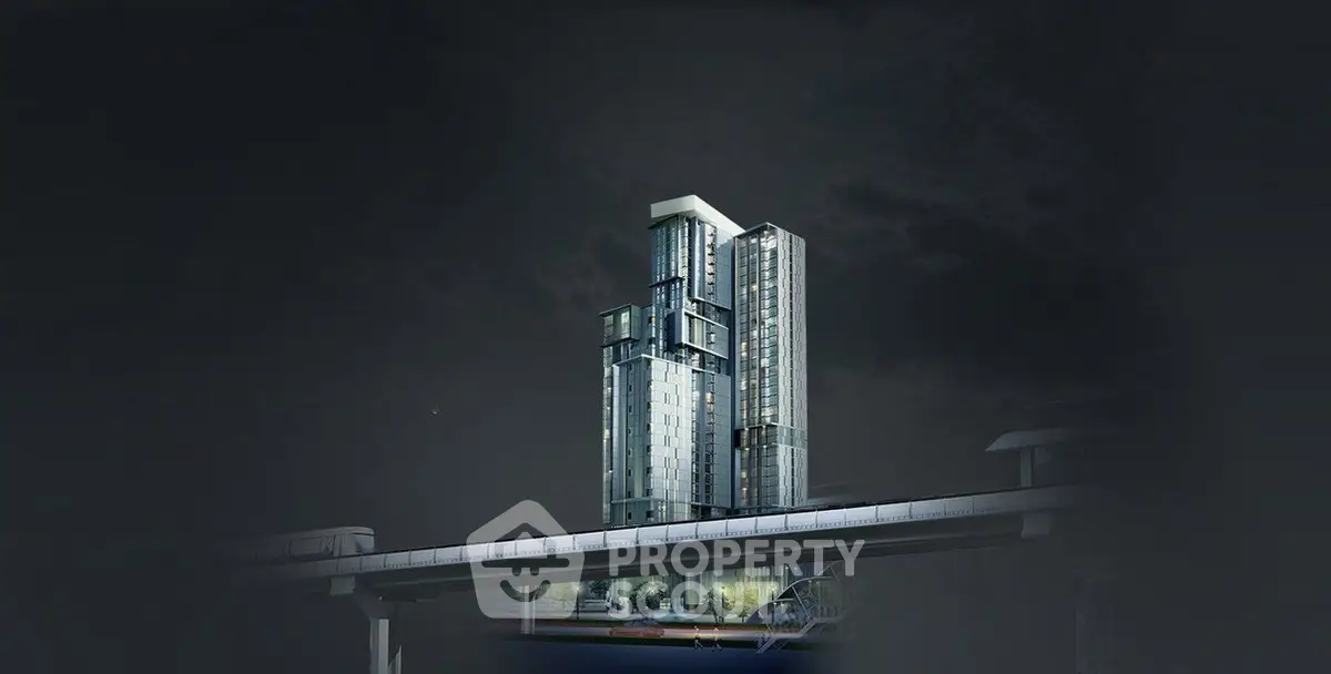 Stunning modern high-rise building with sleek architectural design and illuminated facade at night.