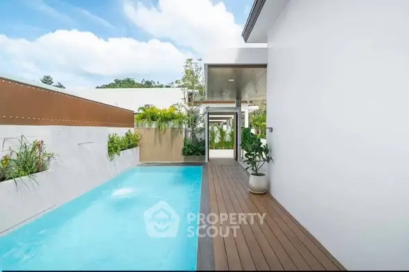 Luxurious modern home with private pool and stylish deck, perfect for relaxation and entertainment.