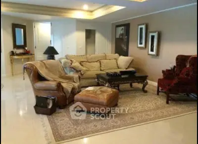 Luxurious living room with elegant furniture and stylish decor in a spacious setting.