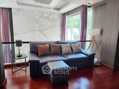 Luxurious living room with elegant leather sofa and stylish decor in modern home.