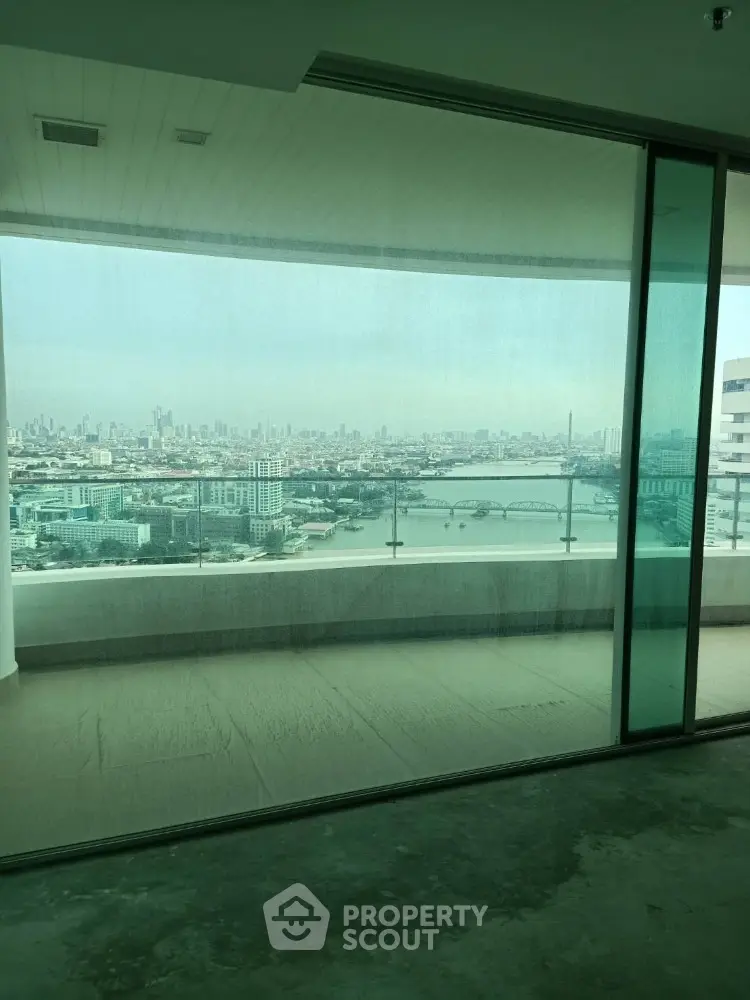 Stunning high-rise balcony with panoramic city and river view