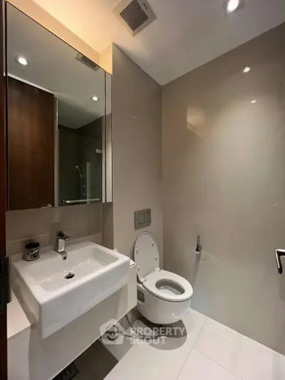 Modern bathroom with sleek fixtures and elegant design in a contemporary home.