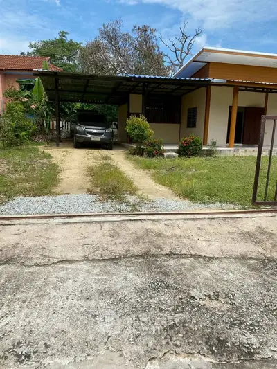 Charming suburban home with carport and lush garden