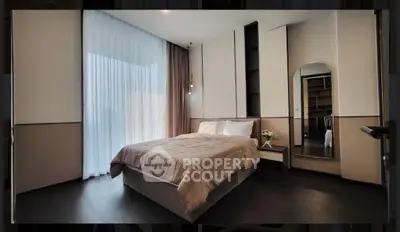 Elegant modern bedroom with floor-to-ceiling windows and stylish decor