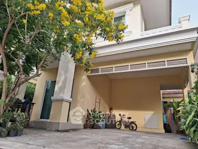 Charming suburban home with spacious driveway and lush garden, perfect for family living.