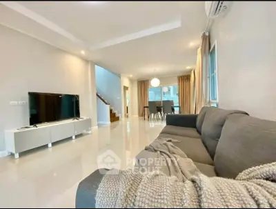 Spacious modern living room with sleek design and open layout