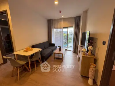 Modern living room with cozy seating and natural light