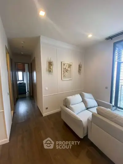 Modern living room with cozy sofa and elegant decor in a bright apartment