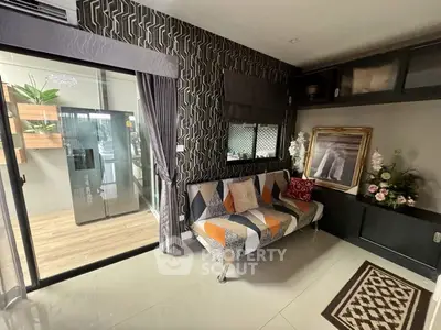 Stylish living room with modern decor and balcony access