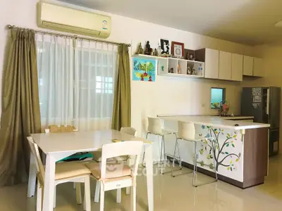 Modern kitchen and dining area with stylish decor and open layout