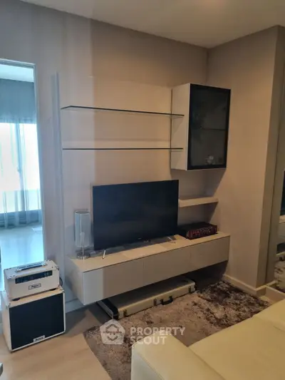Modern living room with sleek TV unit and stylish decor