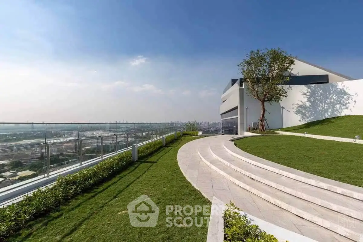 Stunning rooftop garden with panoramic city views and modern architecture.