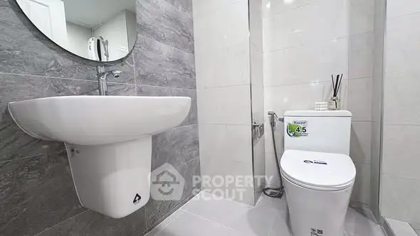 Modern bathroom with sleek design and elegant fixtures.