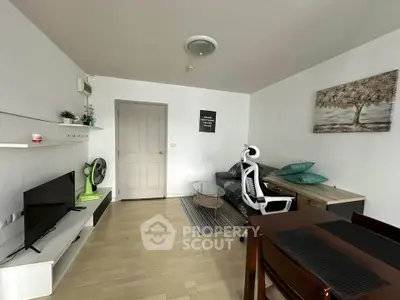 Modern living room with sleek furniture and wall art, perfect for cozy gatherings.