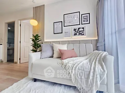 Modern living room with cozy sofa and stylish decor
