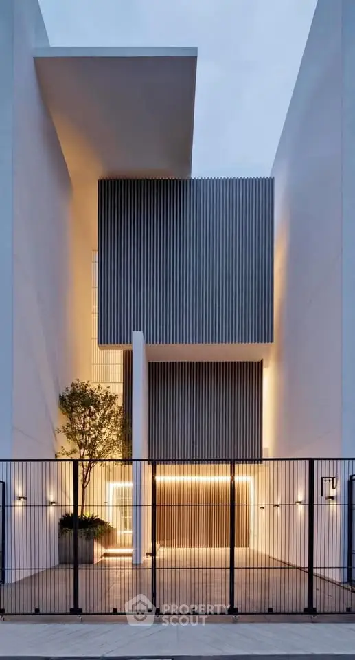 Modern architectural building with sleek design and ambient lighting