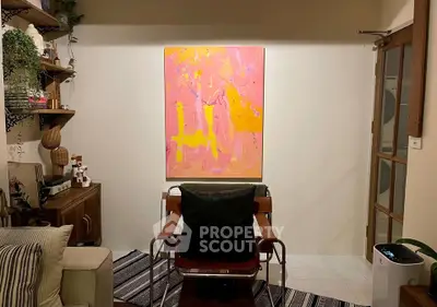 Stylish living room with modern art and cozy seating area
