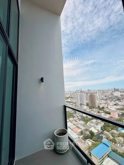 Stunning high-rise balcony with panoramic city view, perfect for urban living enthusiasts.