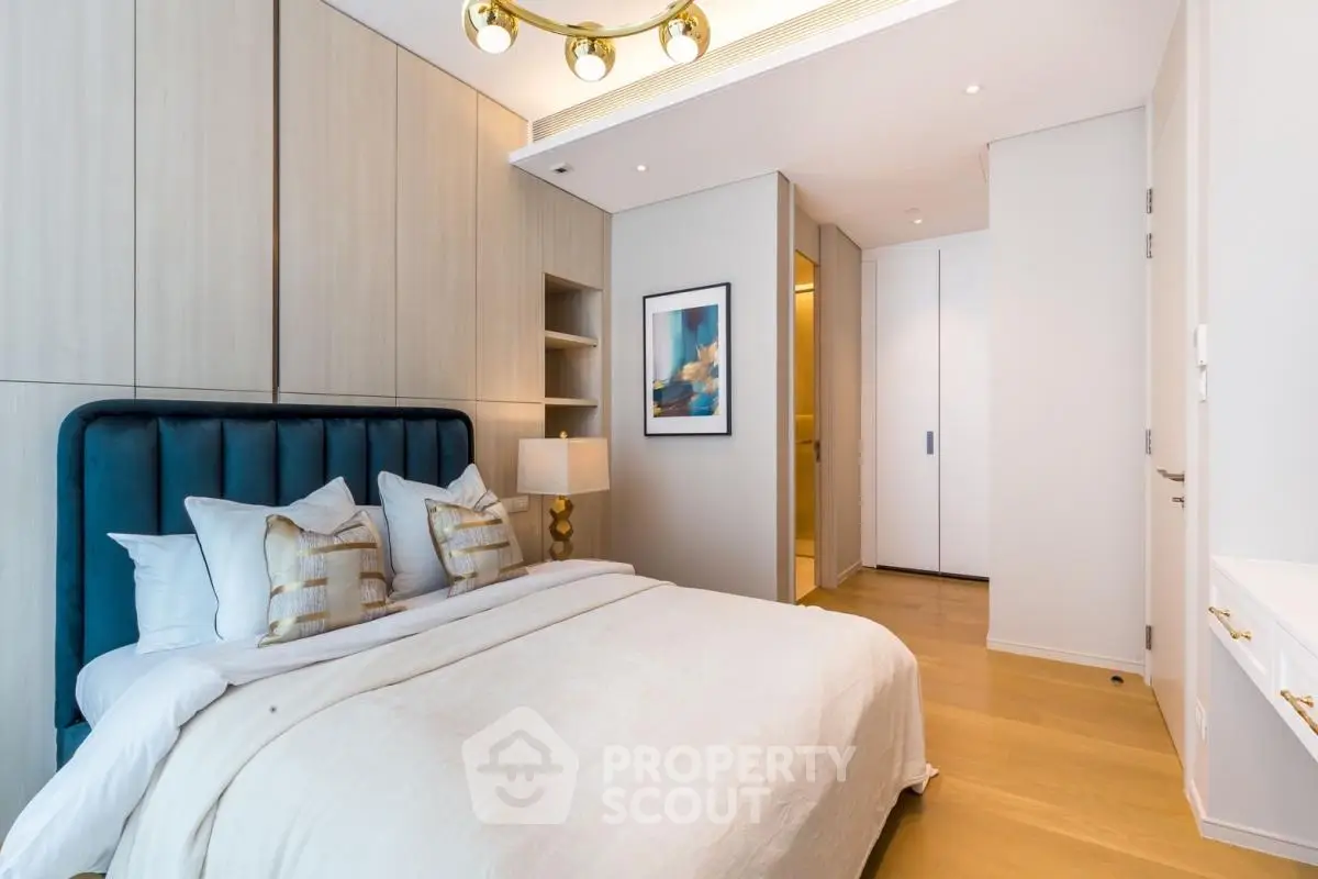 Luxurious modern bedroom with elegant decor and ample storage space