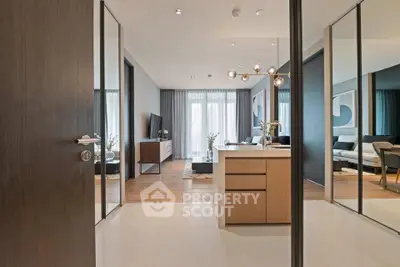 Modern open-plan living room with stylish decor and natural light