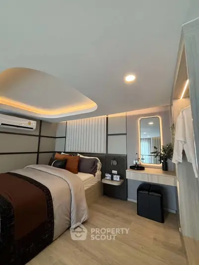 Modern bedroom with stylish decor and ambient lighting