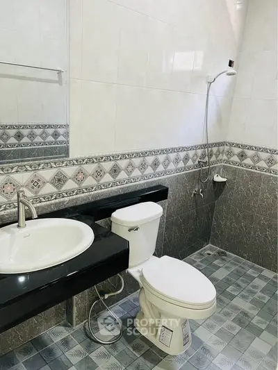 Modern bathroom with stylish tiles and sleek fixtures