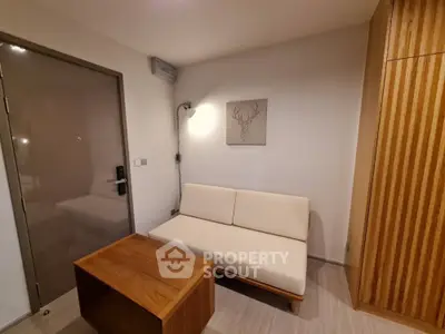 Cozy modern living room with minimalist decor and wooden accents