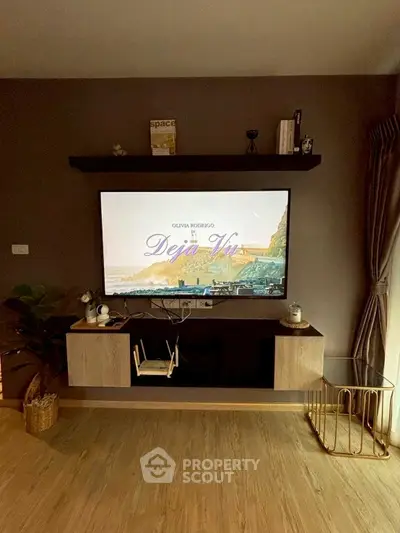 Stylish living room with modern TV setup and elegant decor