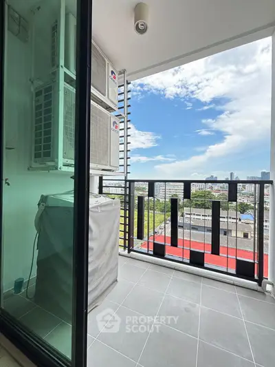 Modern balcony with city view and air conditioning units, perfect for urban living.