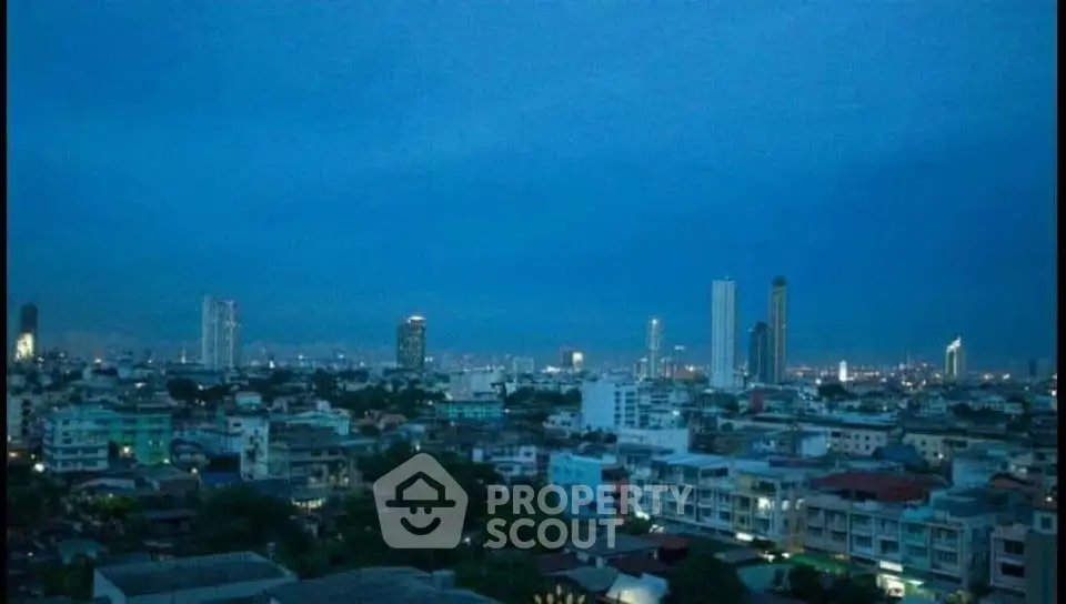Stunning cityscape view showcasing urban skyline at dusk with illuminated skyscrapers.