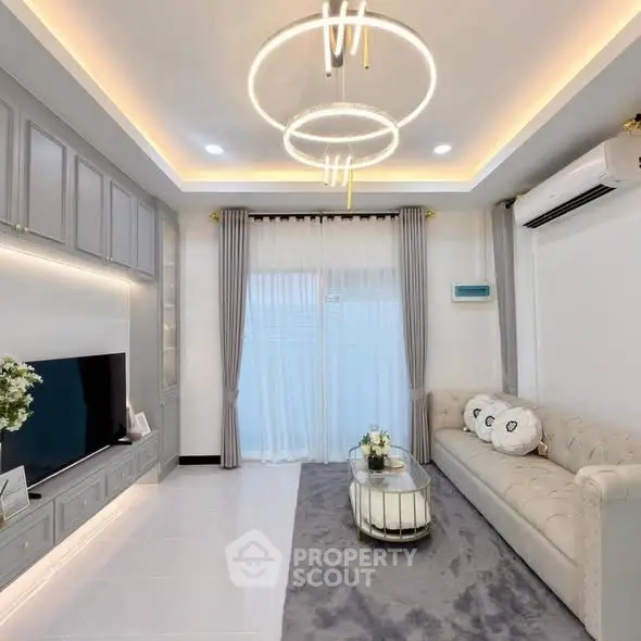 Modern living room with elegant lighting and stylish decor