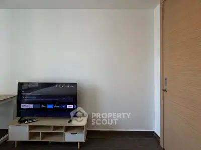 Modern living room with sleek TV setup and minimalist design