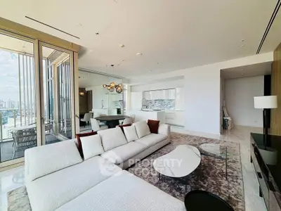 Luxurious modern living room with panoramic city view and elegant decor