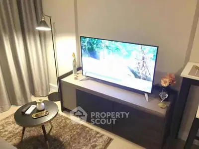 Modern living room with sleek TV setup and stylish decor