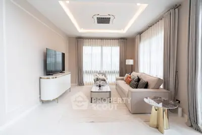 Luxurious modern living room with elegant decor and natural light