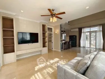 Spacious living room with modern design and natural light