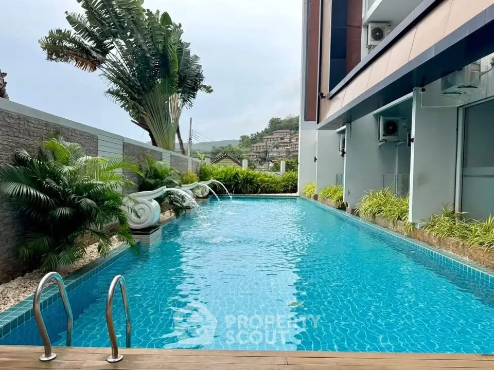 Luxurious modern poolside with lush greenery and elegant design