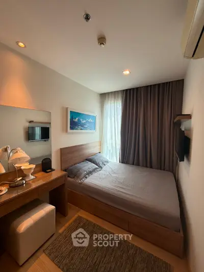 Cozy bedroom with modern decor, featuring a comfortable bed, stylish desk, and soft lighting for a relaxing ambiance.