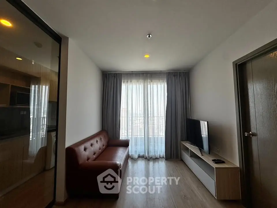 Modern living room with sleek furniture and natural light