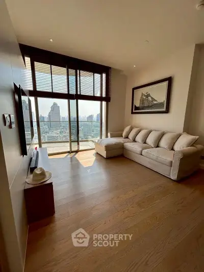 Spacious living room with city view and elegant decor in modern apartment